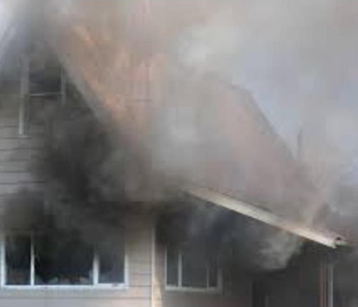 Smoke coming out of a house